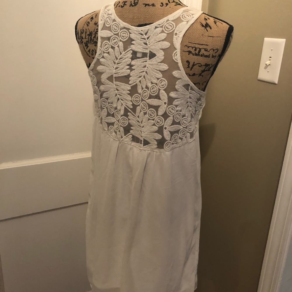 White Dress with Flowerly Lace in back